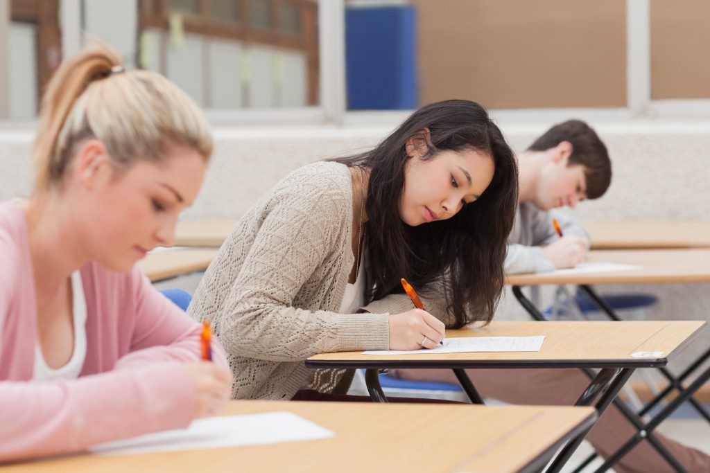 Students concentrating on an exam