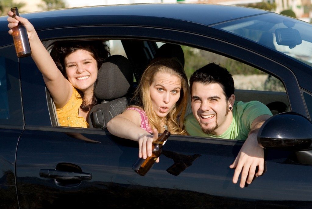 Teenagers drinking while driving