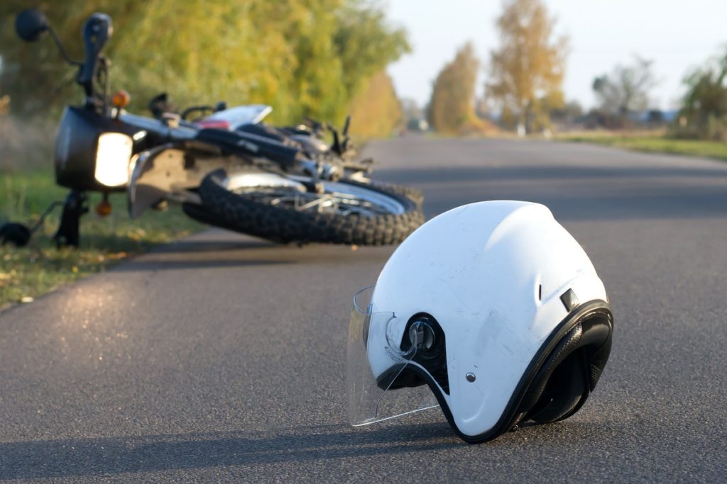 Motorcylce and helmet on the road